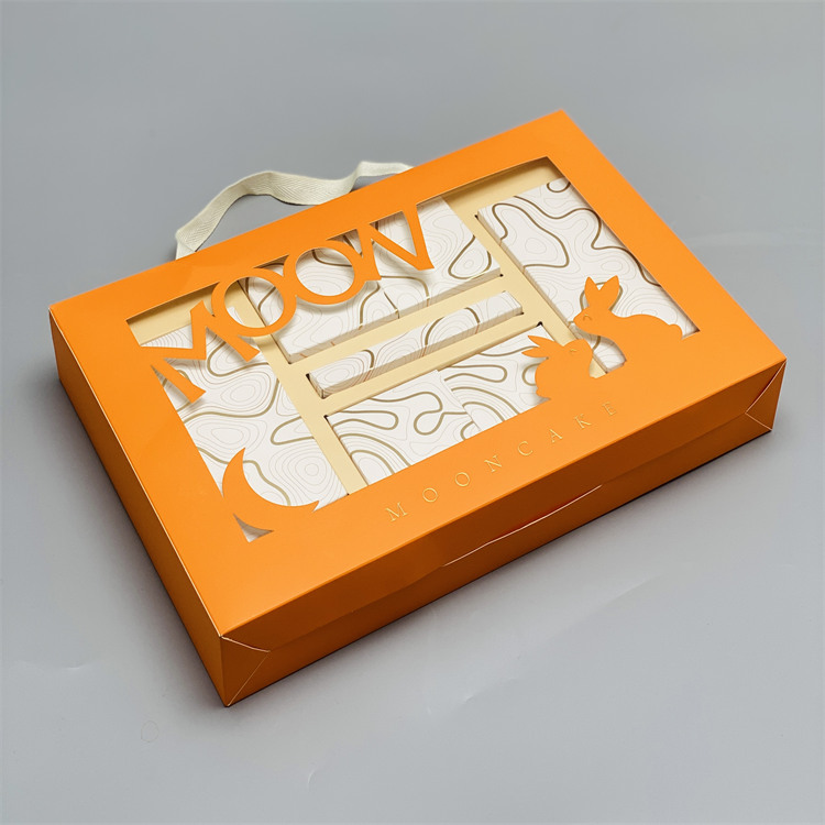 简装橙色镂空月饼礼盒